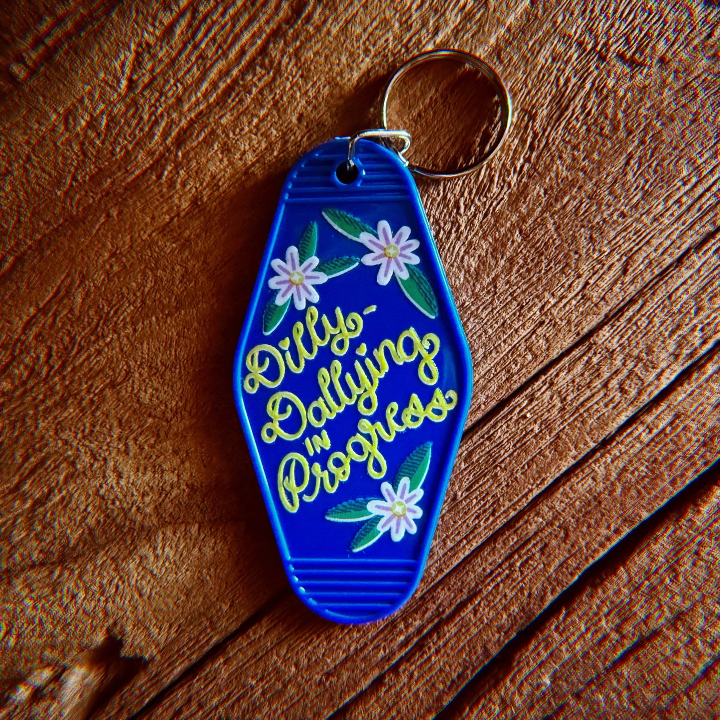 Dilly-Dallying in Progress Keychain, Tan and Silver